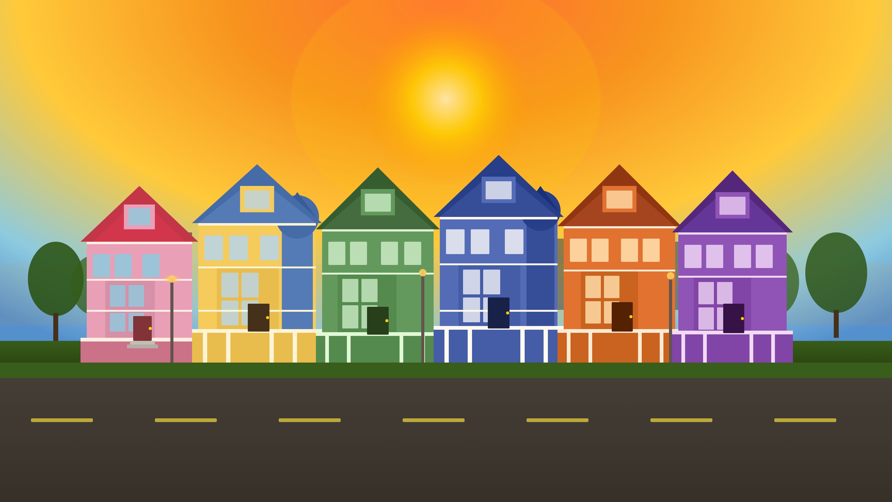 Colorful Victorian row houses on a golden evening street